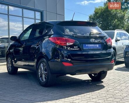 Чорний Хендай Туксон, об'ємом двигуна 2 л та пробігом 164 тис. км за 11490 $, фото 33 на Automoto.ua