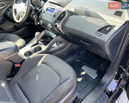 Чорний Хендай Туксон, об'ємом двигуна 2 л та пробігом 164 тис. км за 11490 $, фото 24 на Automoto.ua