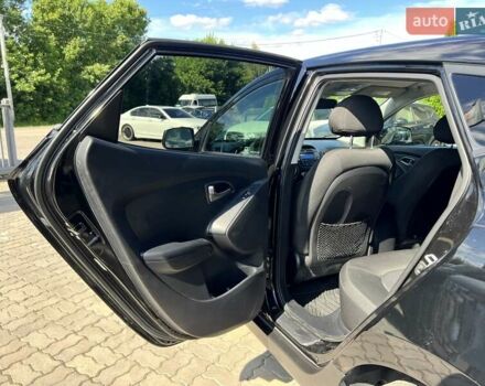 Чорний Хендай Туксон, об'ємом двигуна 2 л та пробігом 164 тис. км за 11490 $, фото 29 на Automoto.ua