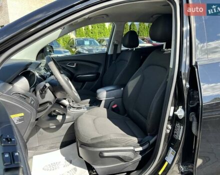 Чорний Хендай Туксон, об'ємом двигуна 2 л та пробігом 164 тис. км за 11490 $, фото 12 на Automoto.ua