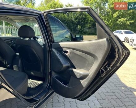 Чорний Хендай Туксон, об'ємом двигуна 2 л та пробігом 164 тис. км за 11490 $, фото 25 на Automoto.ua