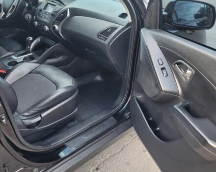 Черный Хендай Туксон, объемом двигателя 2.4 л и пробегом 130 тыс. км за 12400 $, фото 16 на Automoto.ua