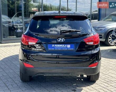 Чорний Хендай Туксон, об'ємом двигуна 2 л та пробігом 164 тис. км за 11490 $, фото 34 на Automoto.ua
