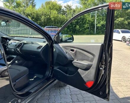 Чорний Хендай Туксон, об'ємом двигуна 2 л та пробігом 164 тис. км за 11490 $, фото 22 на Automoto.ua