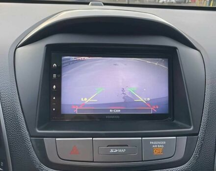 Черный Хендай Туксон, объемом двигателя 2.4 л и пробегом 80 тыс. км за 13000 $, фото 8 на Automoto.ua