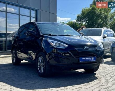 Чорний Хендай Туксон, об'ємом двигуна 2 л та пробігом 164 тис. км за 11490 $, фото 4 на Automoto.ua