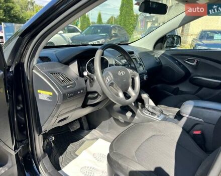 Чорний Хендай Туксон, об'ємом двигуна 2 л та пробігом 164 тис. км за 11490 $, фото 13 на Automoto.ua