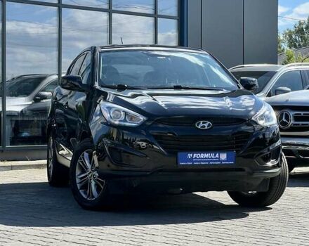 Чорний Хендай Туксон, об'ємом двигуна 2 л та пробігом 164 тис. км за 11490 $, фото 1 на Automoto.ua