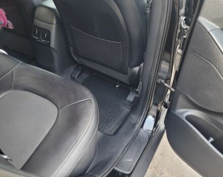 Черный Хендай Туксон, объемом двигателя 2.4 л и пробегом 130 тыс. км за 12400 $, фото 15 на Automoto.ua