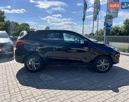 Чорний Хендай Туксон, об'ємом двигуна 2 л та пробігом 164 тис. км за 11490 $, фото 2 на Automoto.ua