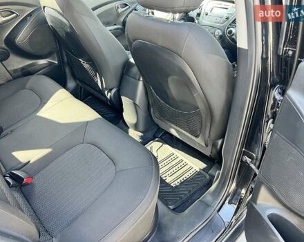 Чорний Хендай Туксон, об'ємом двигуна 2 л та пробігом 164 тис. км за 11490 $, фото 27 на Automoto.ua