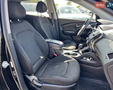 Чорний Хендай Туксон, об'ємом двигуна 2 л та пробігом 164 тис. км за 11490 $, фото 23 на Automoto.ua