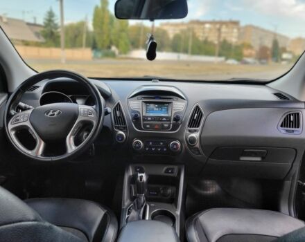 Черный Хендай Туксон, объемом двигателя 2.4 л и пробегом 130 тыс. км за 12400 $, фото 12 на Automoto.ua