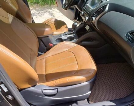 Черный Хендай Туксон, объемом двигателя 2.36 л и пробегом 118 тыс. км за 15000 $, фото 13 на Automoto.ua