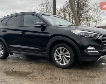 Черный Хендай Туксон, объемом двигателя 2 л и пробегом 190 тыс. км за 18000 $, фото 3 на Automoto.ua