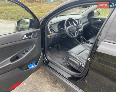 Черный Хендай Туксон, объемом двигателя 2 л и пробегом 190 тыс. км за 18000 $, фото 11 на Automoto.ua