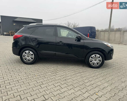 Черный Хендай Туксон, объемом двигателя 2.36 л и пробегом 205 тыс. км за 11200 $, фото 3 на Automoto.ua