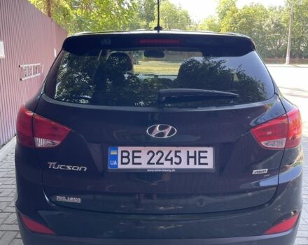 Чорний Хендай Туксон, об'ємом двигуна 2 л та пробігом 140 тис. км за 12300 $, фото 5 на Automoto.ua