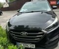 Черный Хендай Туксон, объемом двигателя 2 л и пробегом 151 тыс. км за 15300 $, фото 1 на Automoto.ua