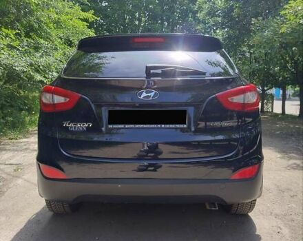Черный Хендай Туксон, объемом двигателя 2.36 л и пробегом 118 тыс. км за 15000 $, фото 5 на Automoto.ua