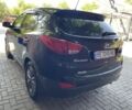 Чорний Хендай Туксон, об'ємом двигуна 2 л та пробігом 140 тис. км за 12300 $, фото 4 на Automoto.ua
