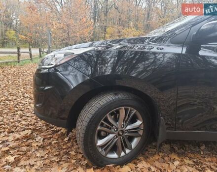 Чорний Хендай Туксон, об'ємом двигуна 2 л та пробігом 109 тис. км за 14500 $, фото 4 на Automoto.ua