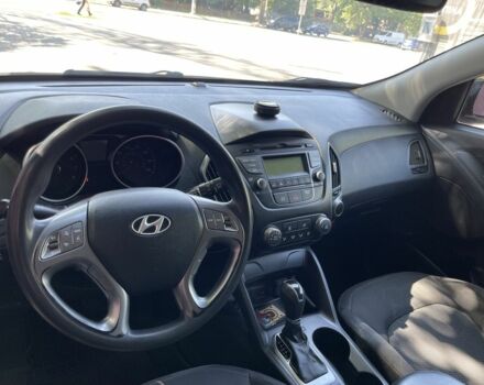 Чорний Хендай Туксон, об'ємом двигуна 2 л та пробігом 140 тис. км за 12300 $, фото 7 на Automoto.ua