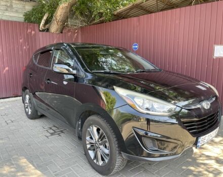 Чорний Хендай Туксон, об'ємом двигуна 2 л та пробігом 140 тис. км за 12300 $, фото 2 на Automoto.ua