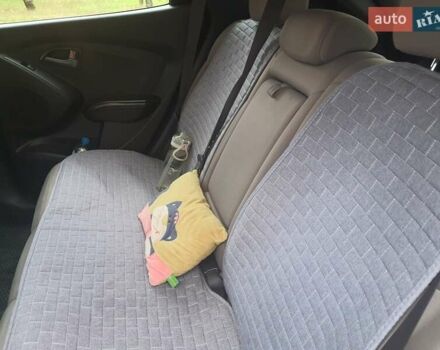 Чорний Хендай Туксон, об'ємом двигуна 2 л та пробігом 109 тис. км за 14500 $, фото 15 на Automoto.ua