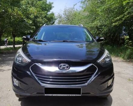 Черный Хендай Туксон, объемом двигателя 2.36 л и пробегом 118 тыс. км за 15000 $, фото 1 на Automoto.ua