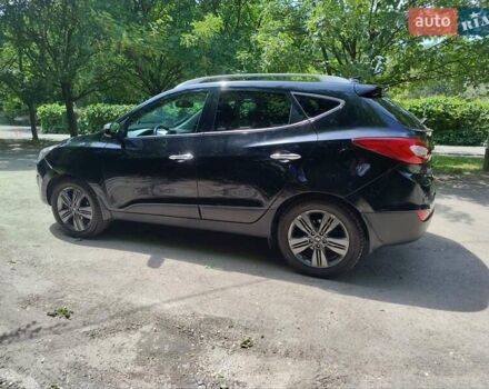 Черный Хендай Туксон, объемом двигателя 2.36 л и пробегом 118 тыс. км за 15000 $, фото 7 на Automoto.ua