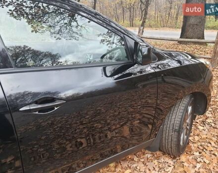 Чорний Хендай Туксон, об'ємом двигуна 2 л та пробігом 109 тис. км за 14500 $, фото 8 на Automoto.ua