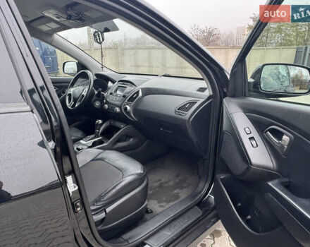 Черный Хендай Туксон, объемом двигателя 2.36 л и пробегом 205 тыс. км за 11200 $, фото 11 на Automoto.ua