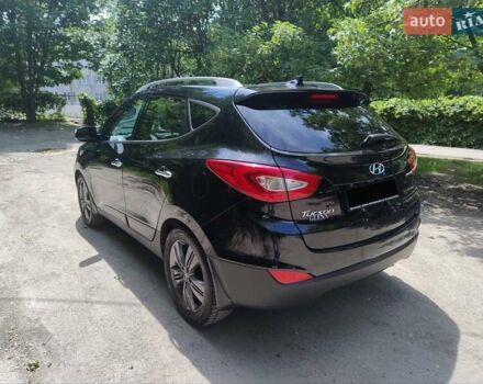 Черный Хендай Туксон, объемом двигателя 2.36 л и пробегом 118 тыс. км за 15000 $, фото 6 на Automoto.ua