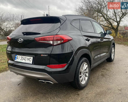 Черный Хендай Туксон, объемом двигателя 2 л и пробегом 190 тыс. км за 18000 $, фото 5 на Automoto.ua