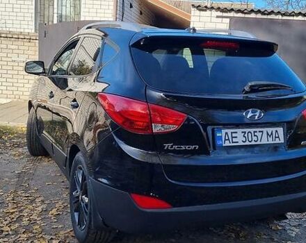 Черный Хендай Туксон, объемом двигателя 2.4 л и пробегом 200 тыс. км за 11000 $, фото 2 на Automoto.ua