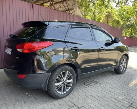 Чорний Хендай Туксон, об'ємом двигуна 2 л та пробігом 140 тис. км за 12300 $, фото 3 на Automoto.ua