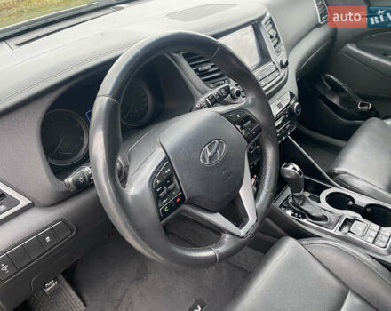 Черный Хендай Туксон, объемом двигателя 2 л и пробегом 190 тыс. км за 18000 $, фото 13 на Automoto.ua