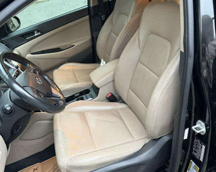 Черный Хендай Туксон, объемом двигателя 1.6 л и пробегом 123 тыс. км за 17500 $, фото 23 на Automoto.ua