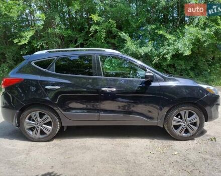 Черный Хендай Туксон, объемом двигателя 2.36 л и пробегом 118 тыс. км за 15000 $, фото 2 на Automoto.ua