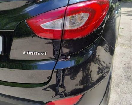 Черный Хендай Туксон, объемом двигателя 2.36 л и пробегом 118 тыс. км за 15000 $, фото 20 на Automoto.ua