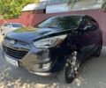 Чорний Хендай Туксон, об'ємом двигуна 2 л та пробігом 140 тис. км за 12300 $, фото 1 на Automoto.ua
