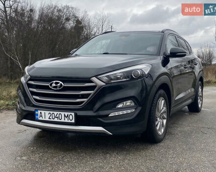 Черный Хендай Туксон, объемом двигателя 2 л и пробегом 190 тыс. км за 18000 $, фото 1 на Automoto.ua