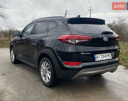 Черный Хендай Туксон, объемом двигателя 2 л и пробегом 190 тыс. км за 18000 $, фото 6 на Automoto.ua
