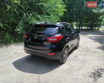 Черный Хендай Туксон, объемом двигателя 2.36 л и пробегом 118 тыс. км за 15000 $, фото 4 на Automoto.ua