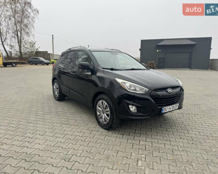 Черный Хендай Туксон, объемом двигателя 2.36 л и пробегом 205 тыс. км за 11200 $, фото 2 на Automoto.ua