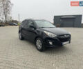 Черный Хендай Туксон, объемом двигателя 2.36 л и пробегом 205 тыс. км за 11200 $, фото 2 на Automoto.ua