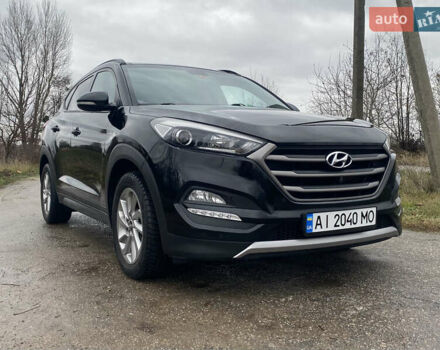 Черный Хендай Туксон, объемом двигателя 2 л и пробегом 190 тыс. км за 18000 $, фото 2 на Automoto.ua