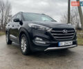 Черный Хендай Туксон, объемом двигателя 2 л и пробегом 190 тыс. км за 18000 $, фото 2 на Automoto.ua