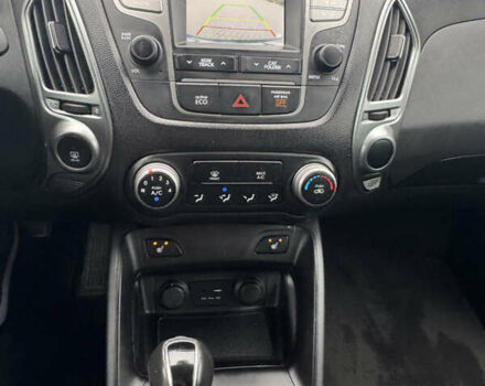 Черный Хендай Туксон, объемом двигателя 2.36 л и пробегом 205 тыс. км за 11200 $, фото 13 на Automoto.ua